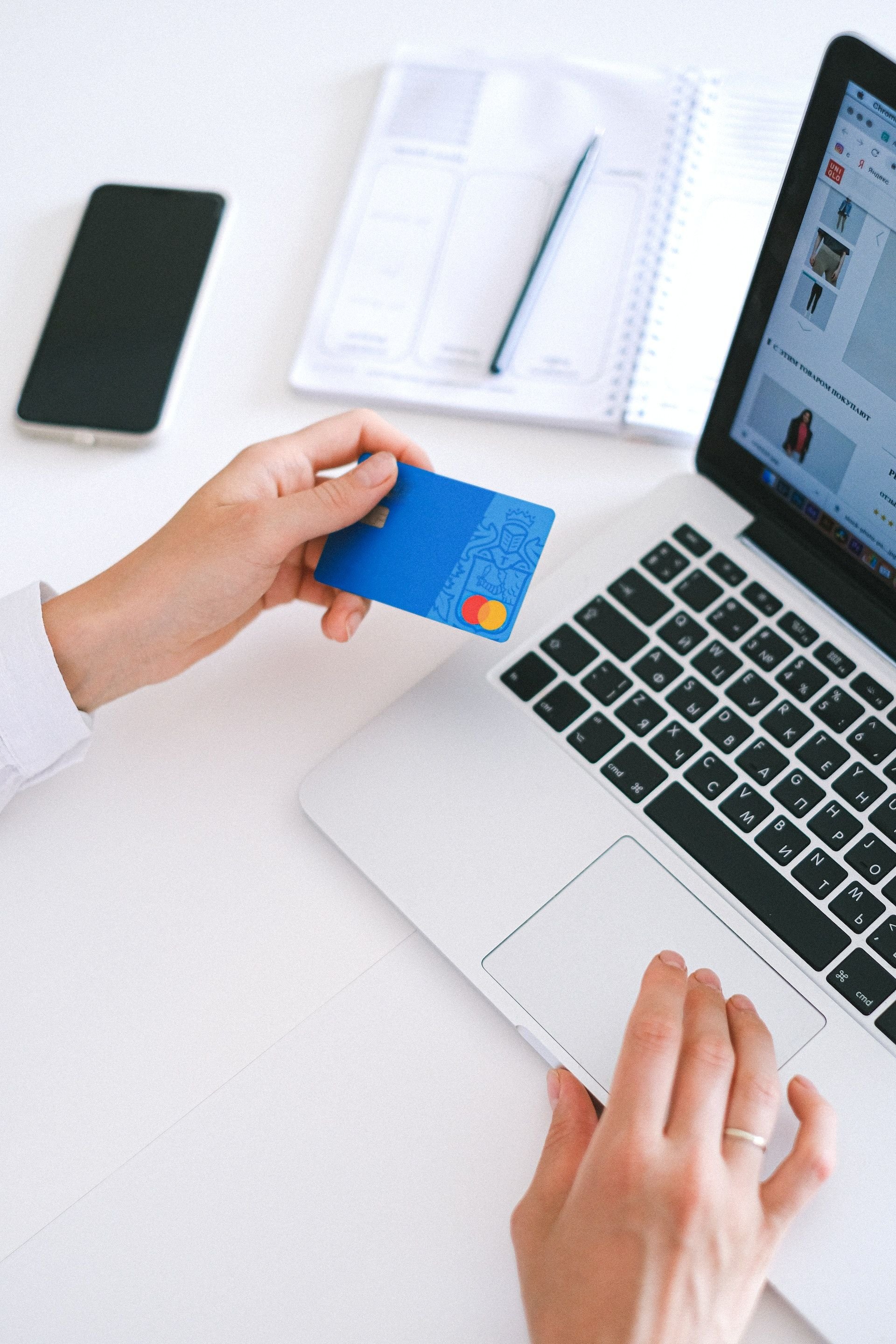 Bank card and laptop and notebook