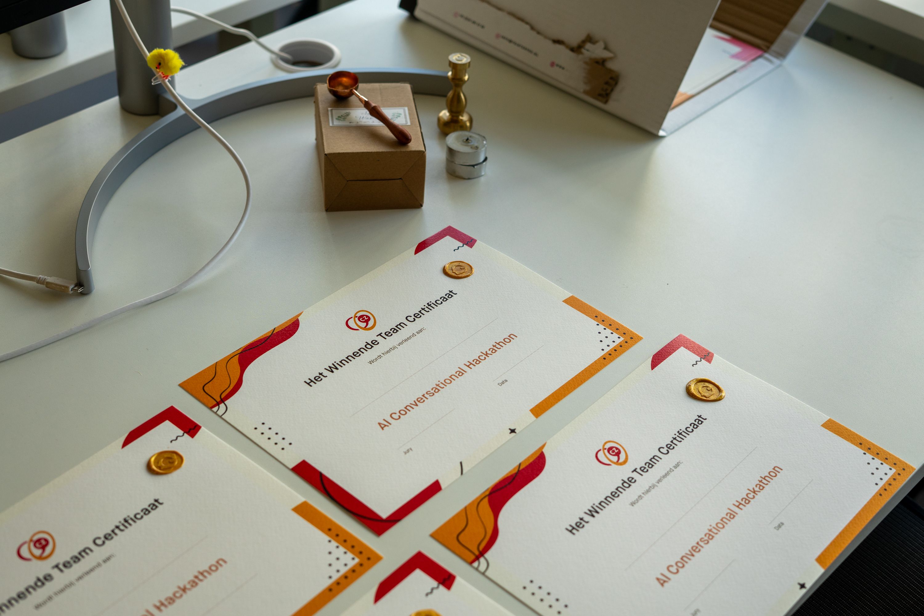 De certificaten voor het winnende team